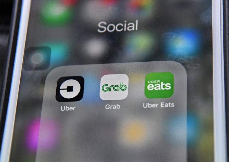 Kesepakatan Grab-Uber: kesepakatan merger atau pembagian pasar?