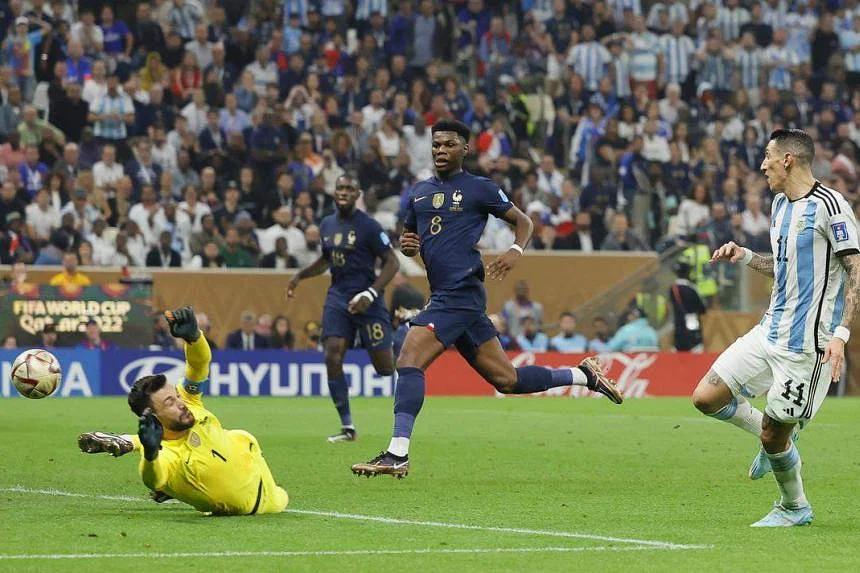 Angel di Maria (right) scores the 2-0 lead against France. PHOTO: EPA-EFE 