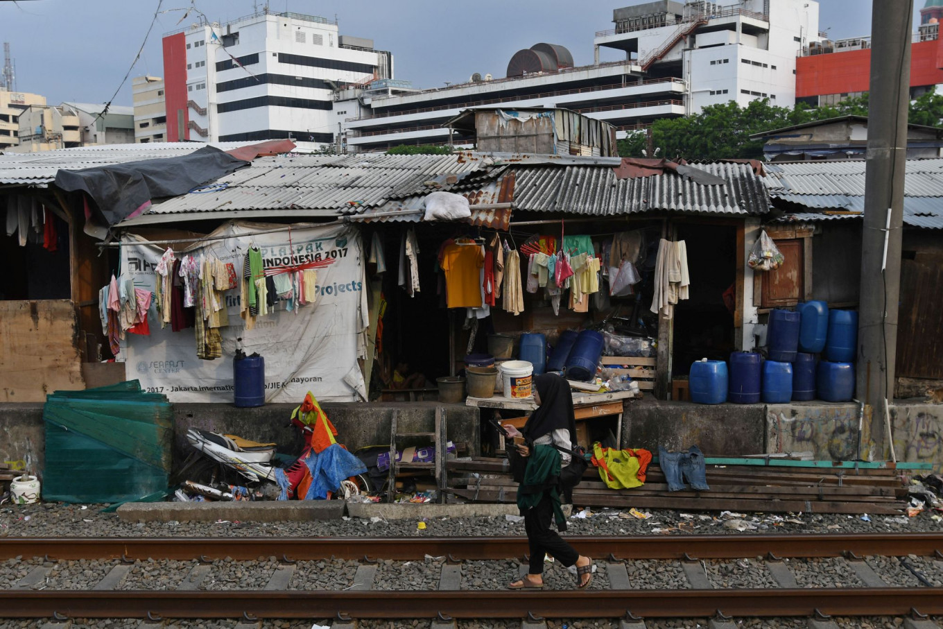 Indonesian poverty drops to historic low as inequality narrows - Asia ...