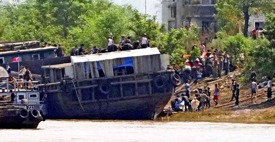 Flood damage in North Korea visible from across border; UN agency warns of more rain