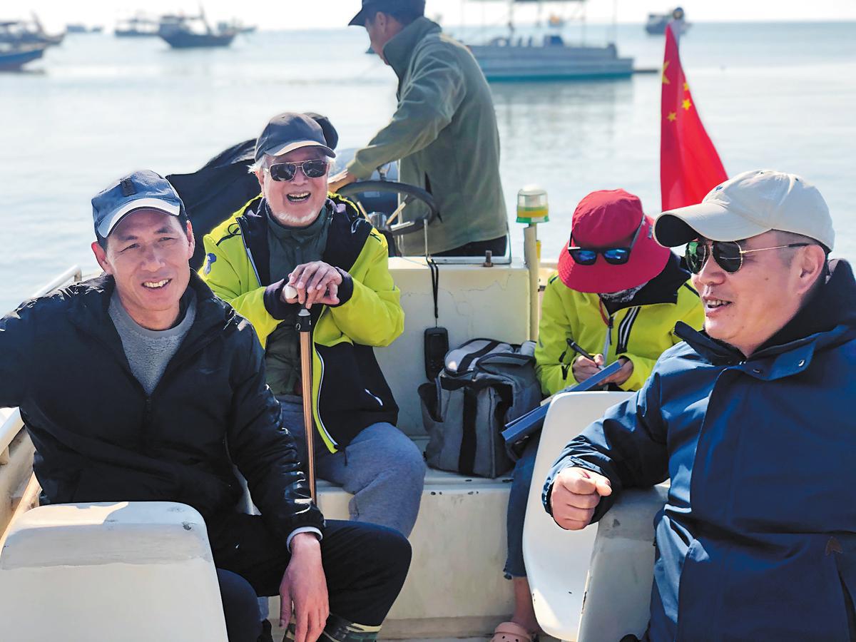 Dedicated Chinese family provides safety net for protected dolphins