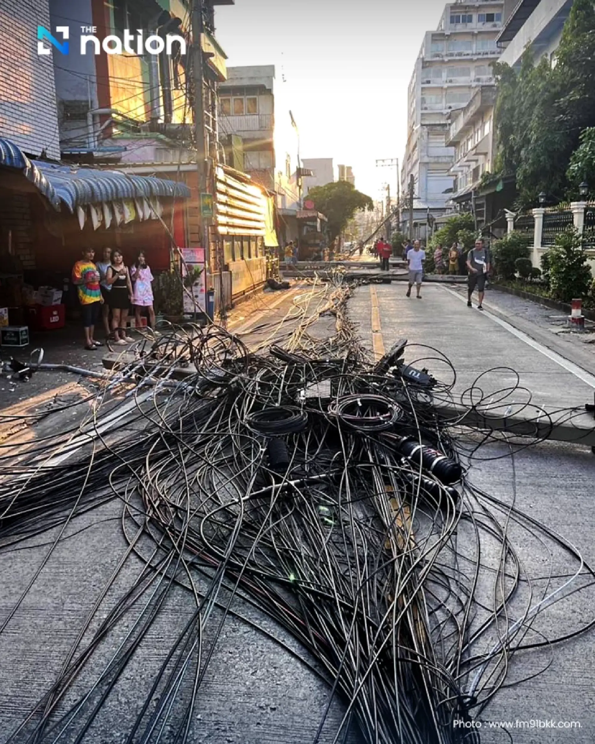 Car crash in Bangkok knocks down 12 posts