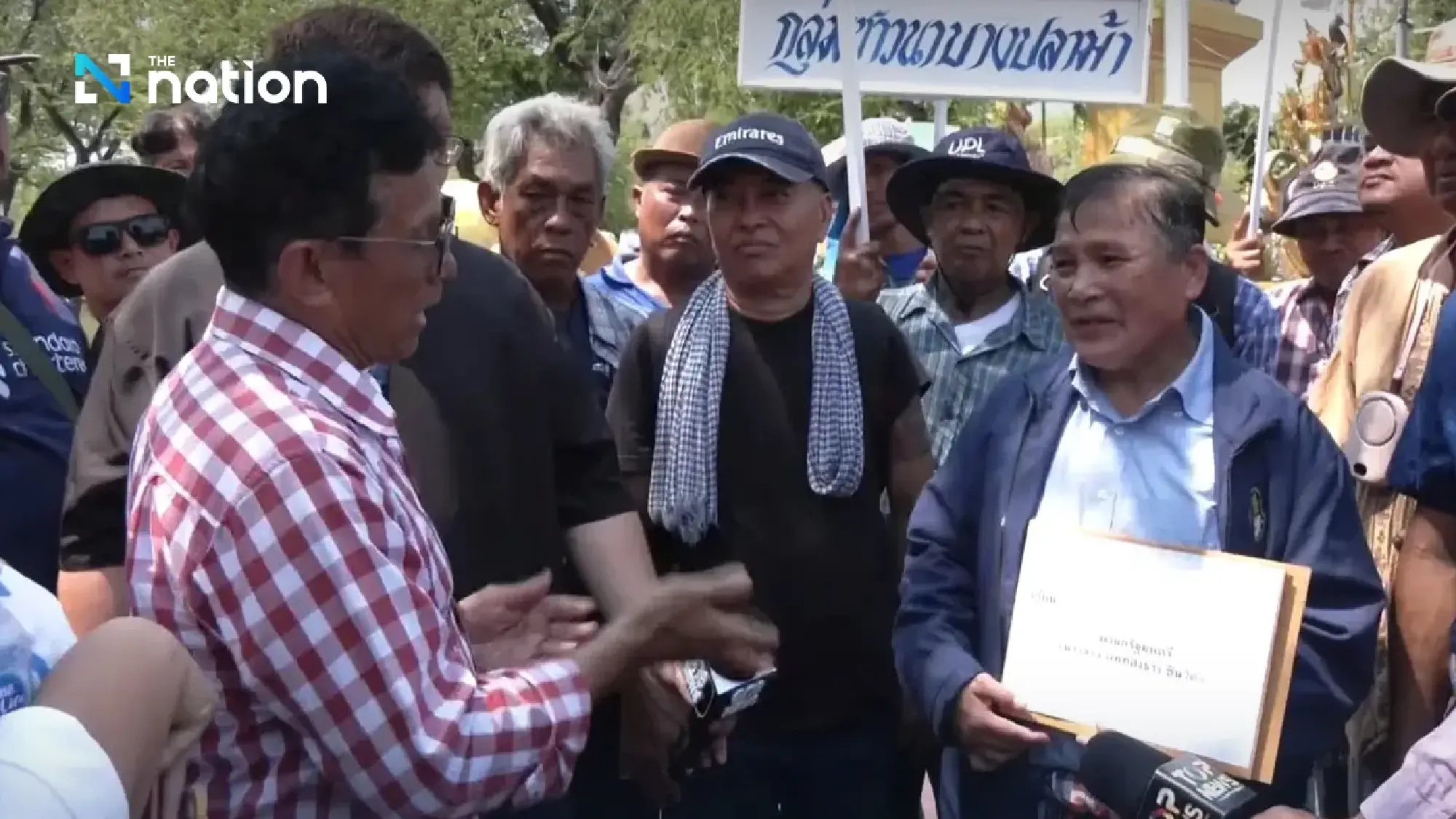 Thai farmers rally near Government House, demand rice price guarantee