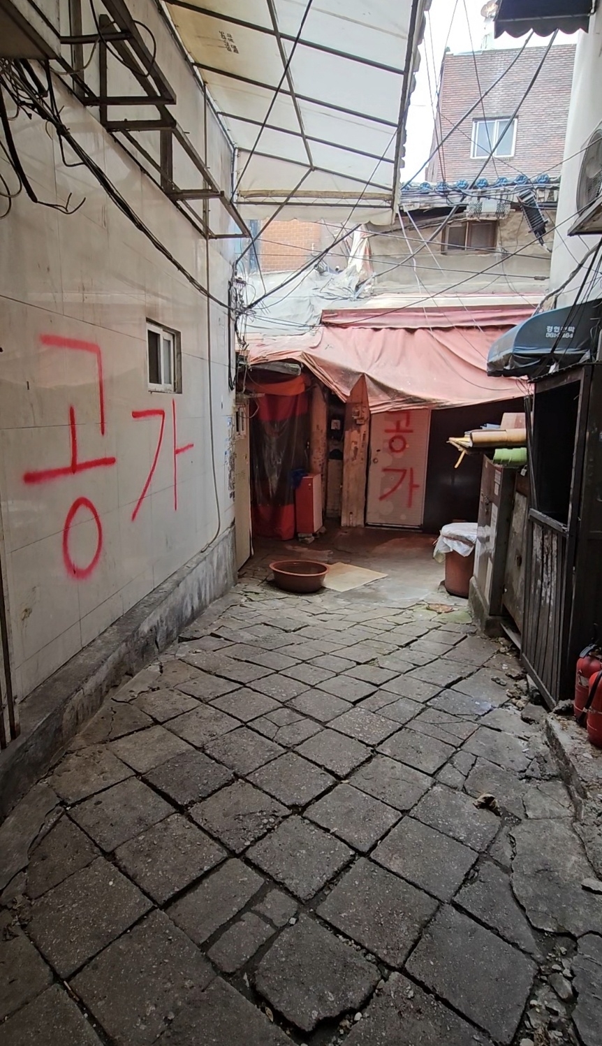 'Kicked out in pajamas': Women in Seoul's fading red-light district protest evictions