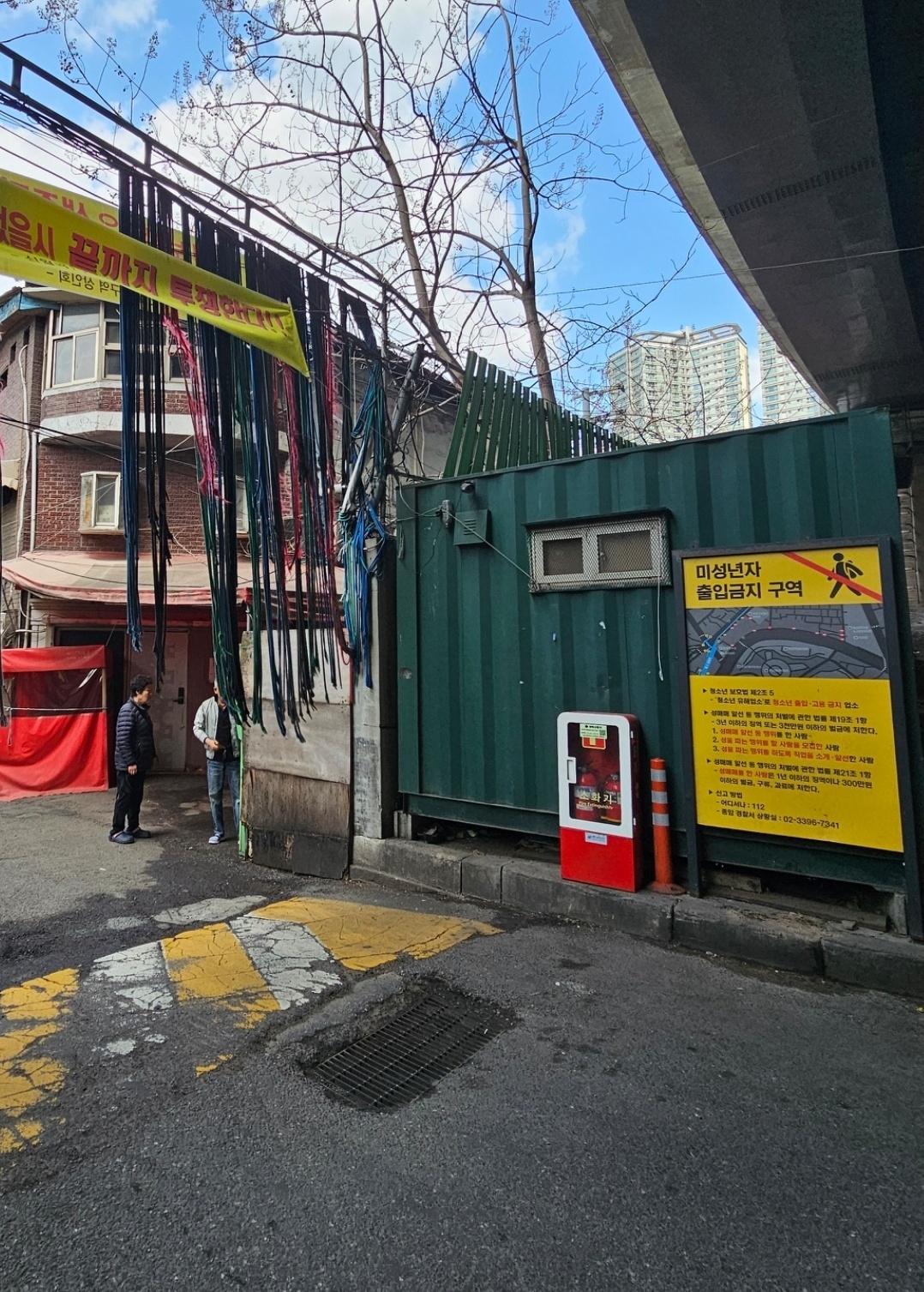 'Kicked out in pajamas': Women in Seoul's fading red-light district protest evictions