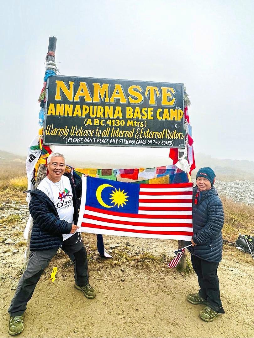 Malaysian couple redefines senior living by climbing mountains, running marathons