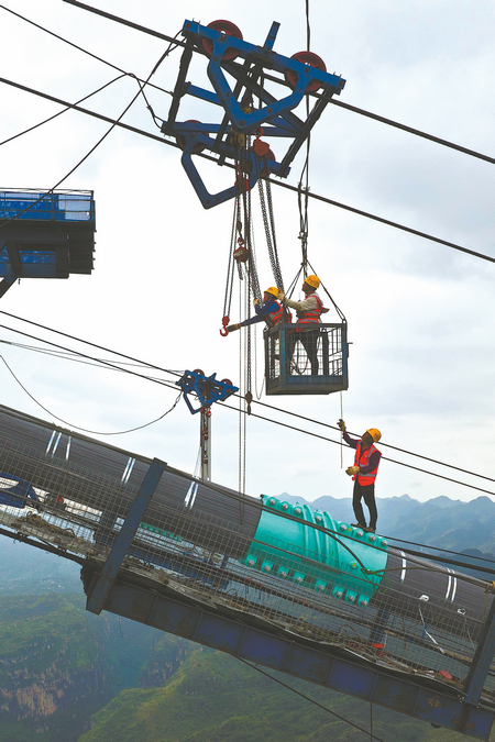 See the labour behind the world's tallest bridge in China’s Guizhou