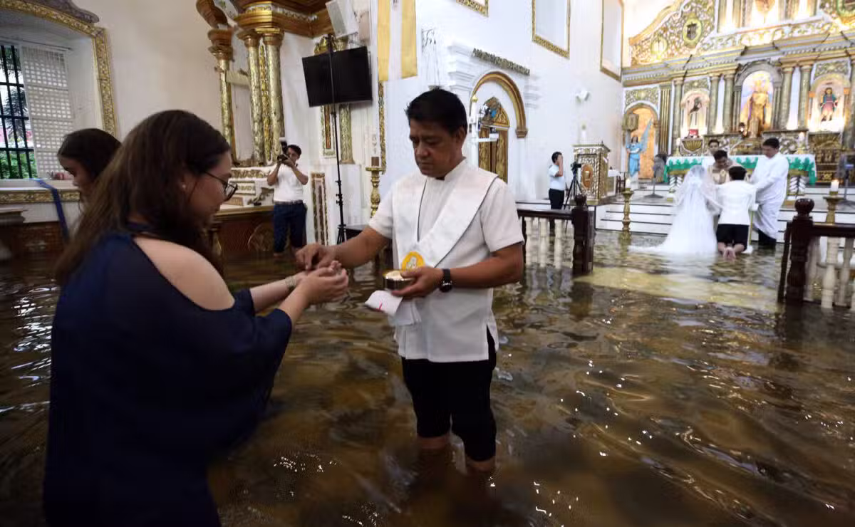 Love in the Time of Monsoon: A flooded Philippine church wedding