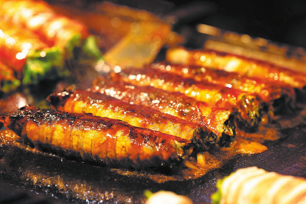 With 'smoke, fire and steam', China’s night markets erupt into life