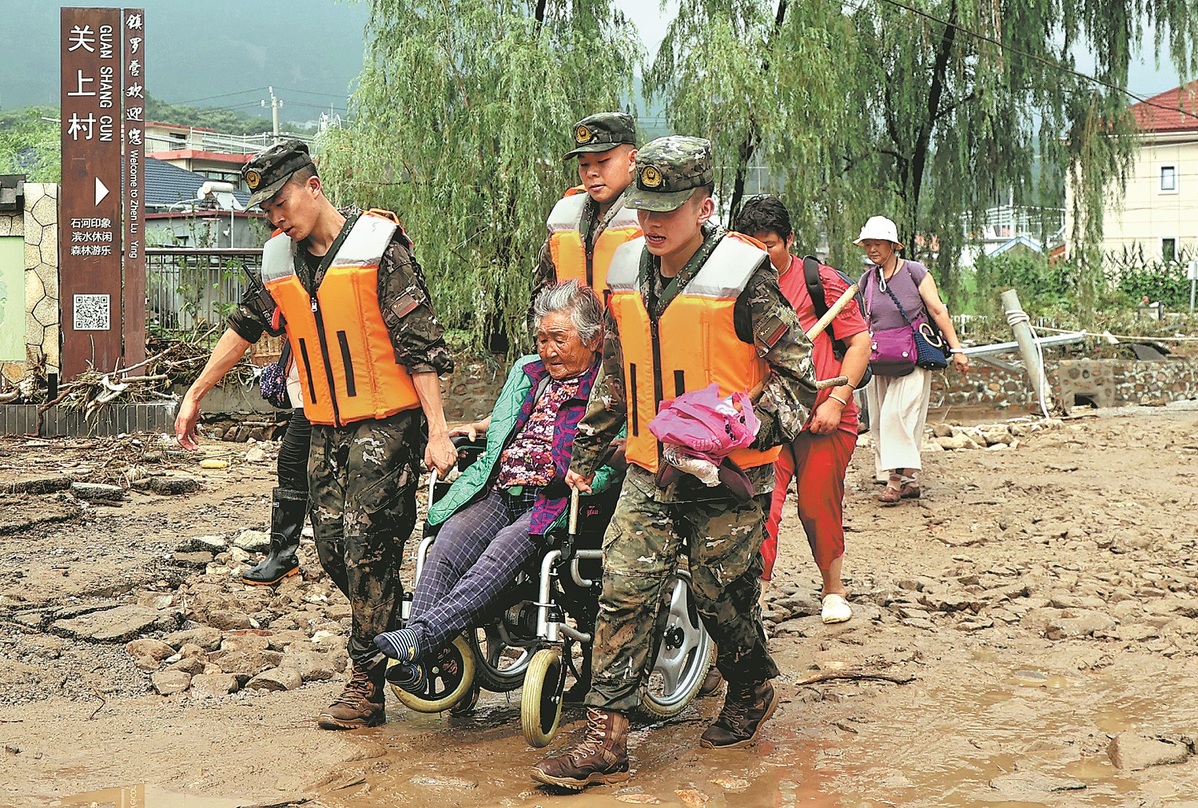 Chinese President Xi urges all-out flood relief efforts after days of torrential rain