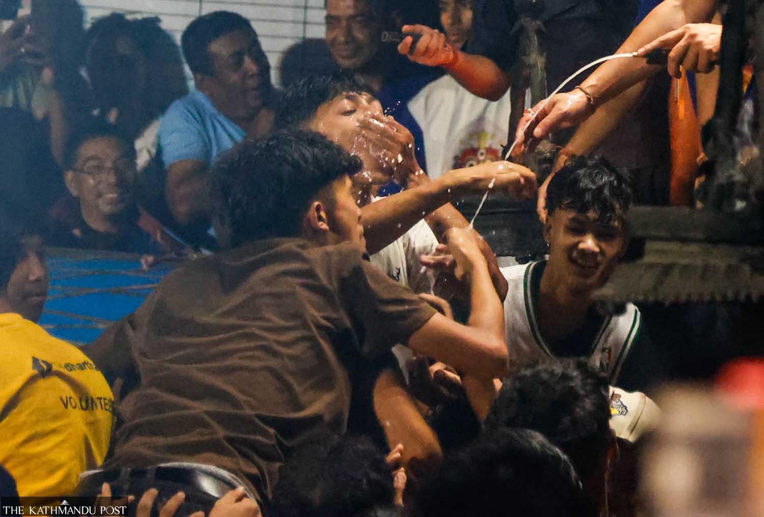 Devotees jostle to drink liquor during Nepal’s Indra Jatra celebrations