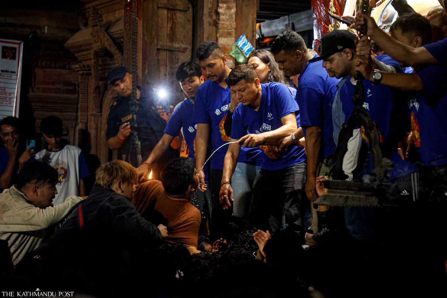 Devotees jostle to drink liquor during Nepal’s Indra Jatra celebrations