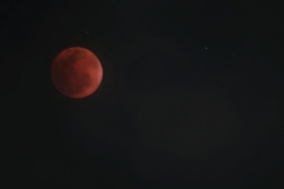Blood moon rises during total lunar eclipse, but Singapore stargazers’ view hampered by clouds