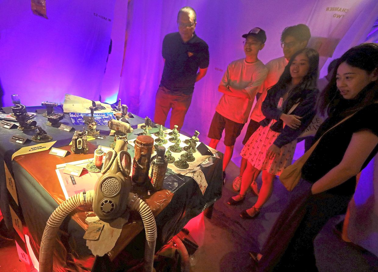 Malaysian artist and filmmaker turns art gallery into recycled robot apocalypse