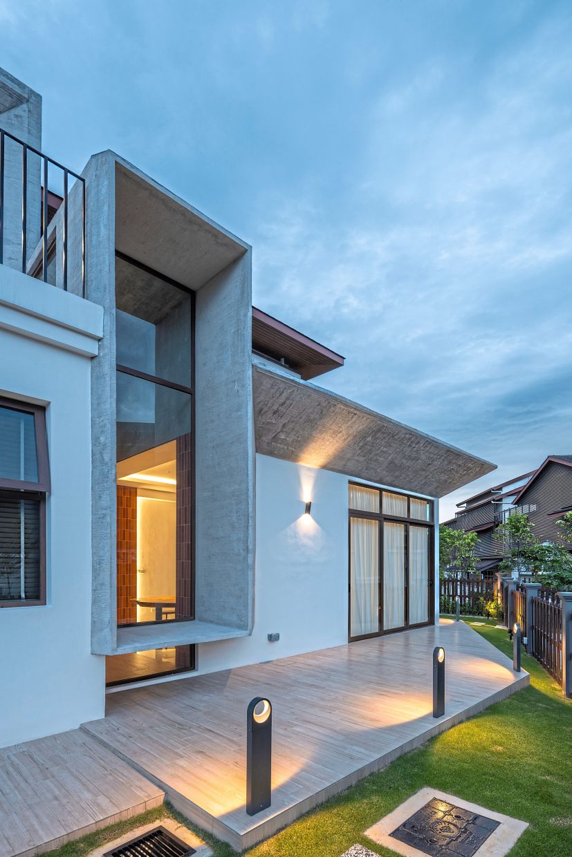 Malaysian architect turns 'ordinary house' into sculptural, liveable home