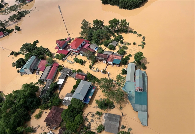 Post-storm floods devastate crops, homes across northern Vietnam