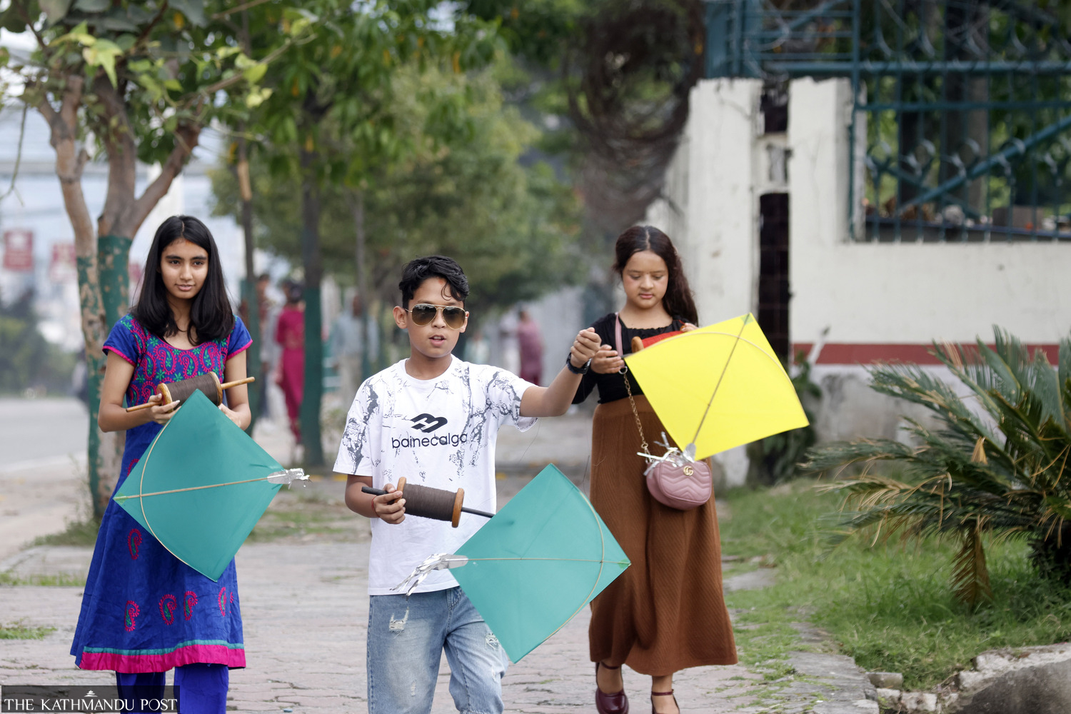 Festive spirit takes over Nepal: Children soar high on bamboo swings, travellers leave for hometowns