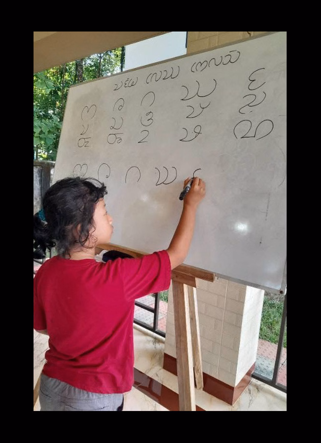 One young Bangladeshi’s mission to keep an indigenous script alive