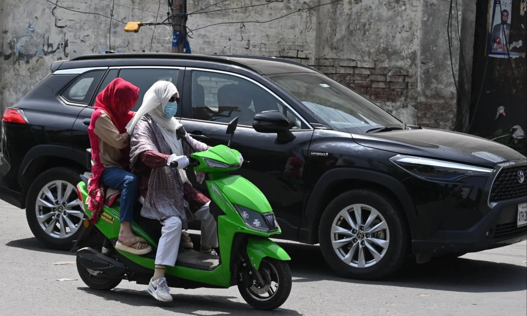 Women claiming the road in Pakistan’s Peshawar, defining a quiet scooter revolution