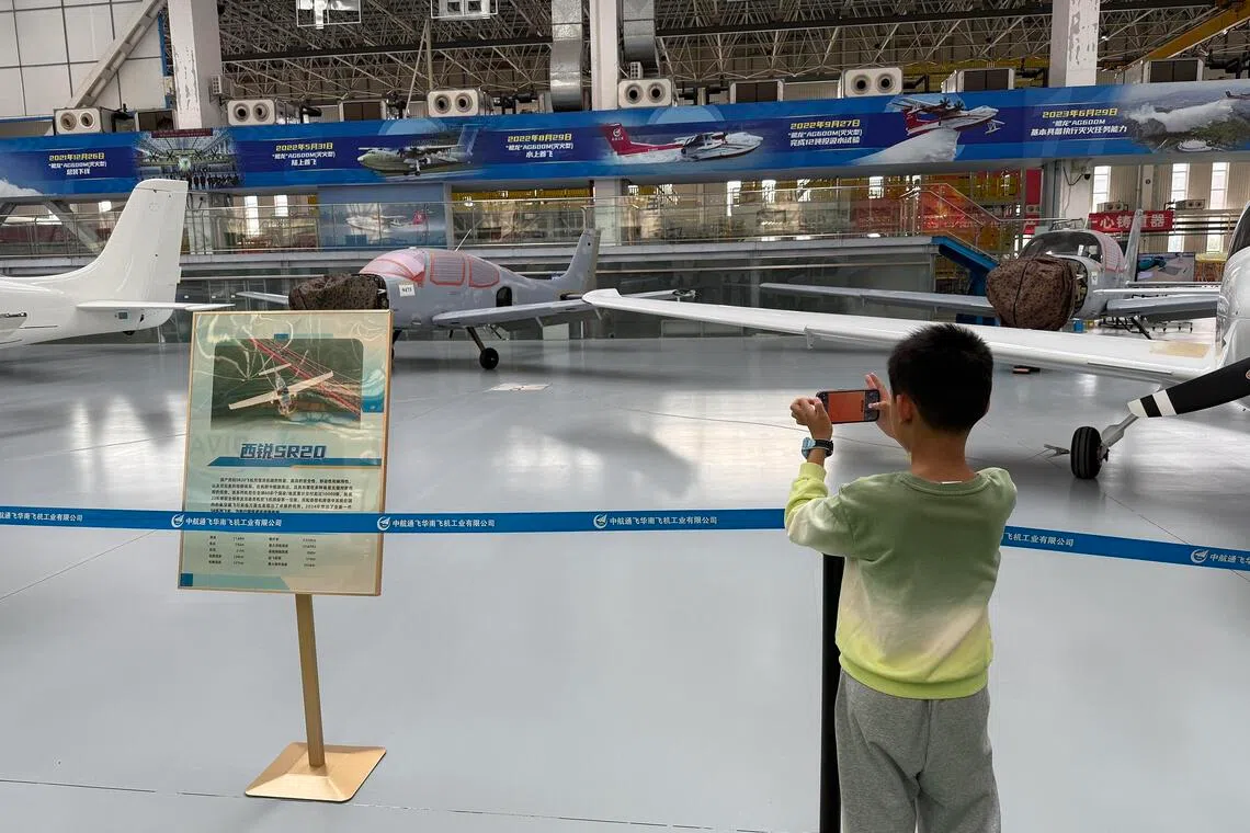 From planes and cars to beer, factory tours a draw for young Chinese