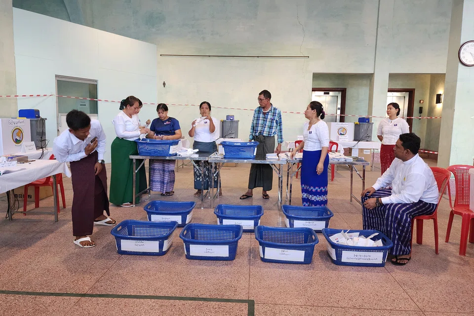 Soldiers with guns, short lines of voters: Myanmar goes to the polls for first time since 2021 coup