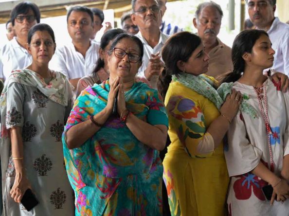 US officials survey Air India crash site, families continue to wait for bodies