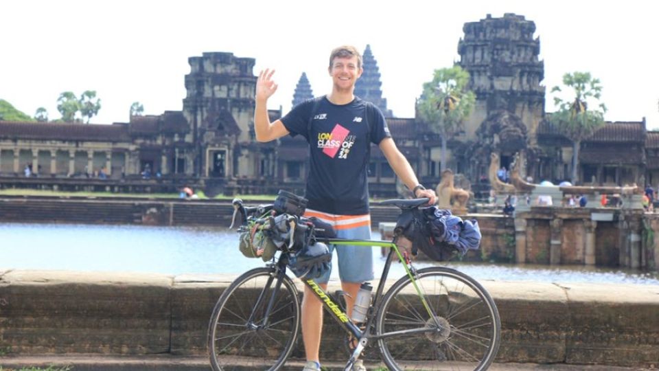 27_10_2024_uk_cyclist_tim_jones_poses_for_a_shot_at_angkor_archaeological_park_on_october_23.jpg