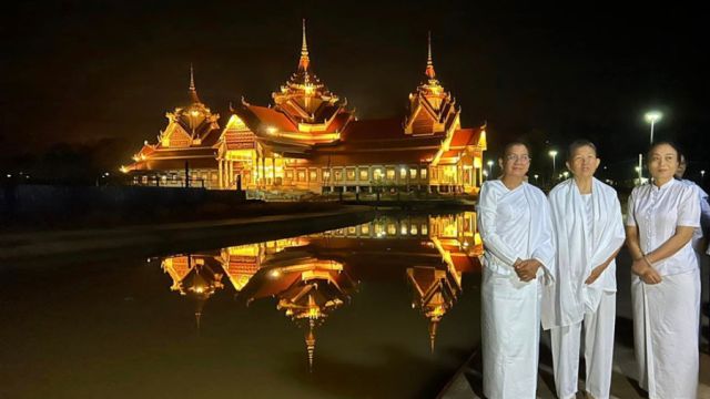 4_12_2023_Nhek-Buntha-centre-poses-for-a-photo-near-the-Buddhist-Cultural-Centre-of-Cambodia-on-Kirirom-Mountain.-Nhek-Buntha-via-FB.jpg