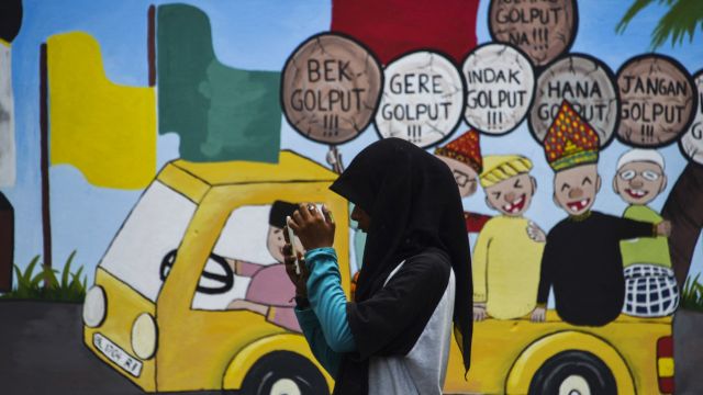 AFP__20190317__1EQ5WP__v1__MidRes__IndonesiaPoliticsVote.jpg