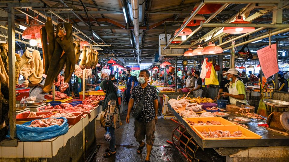 AFP__20210421__98F36P__v1__MidRes__MalaysiaEconomy.jpg