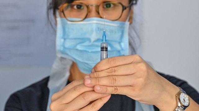 AFP__20210621__9CP94A__v1__MidRes__MalaysiaHealthVirus.jpg