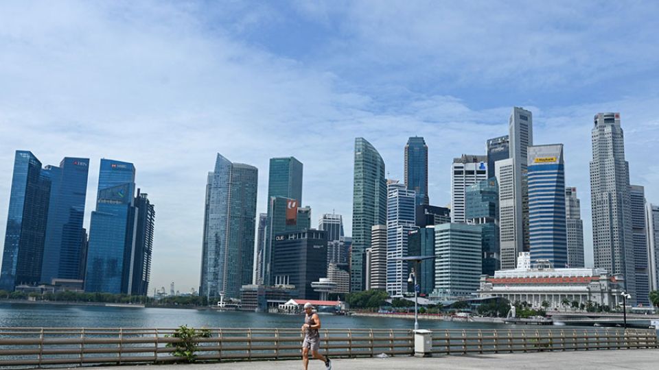 AFP__20220217__322W6KK__v1__MidRes__SingaporeEconomy.jpg