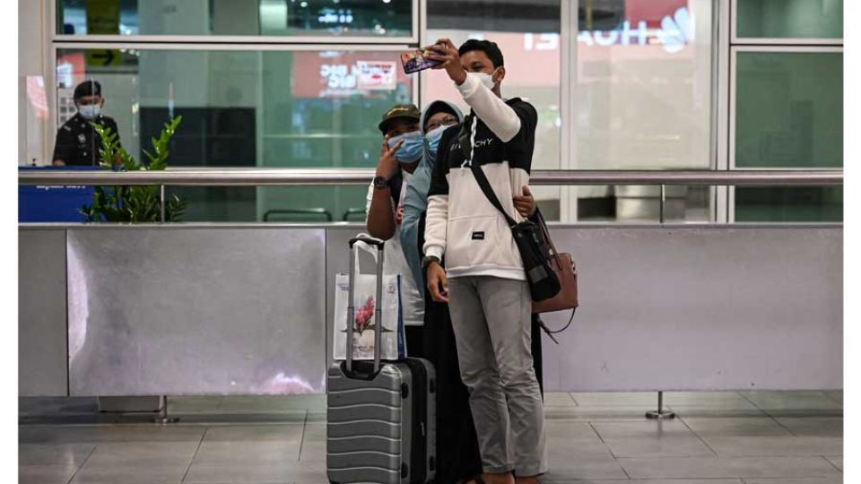 AFP__20220401__327E2AV__v1__MidRes__MalaysiaHealthVirusTravel.jpg