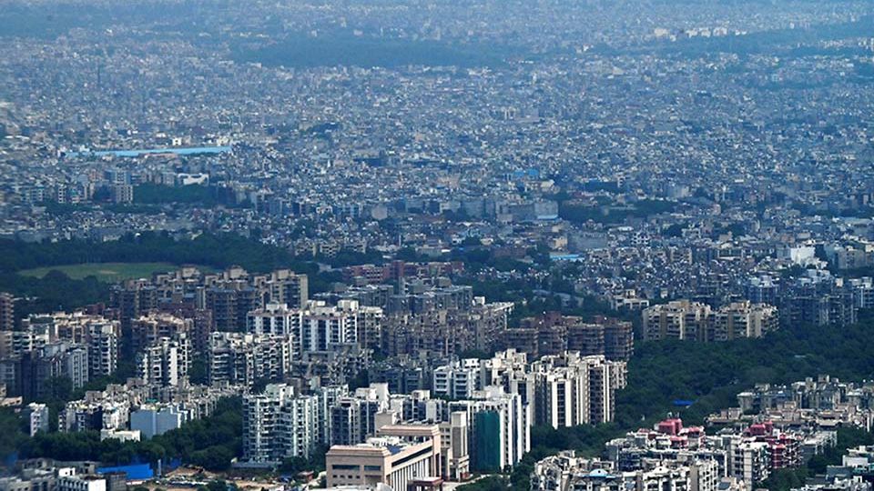AFP__20230906__33UC2UH__v1__Preview__IndiaHousingLandscape.jpg
