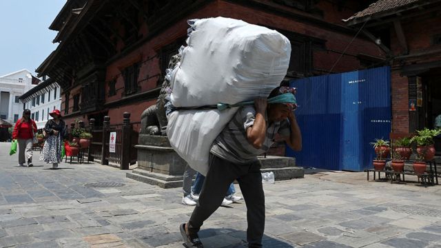 AFP__20240501__34QK7AX__v1__MidRes__NepalEconomyLabourDay.jpg