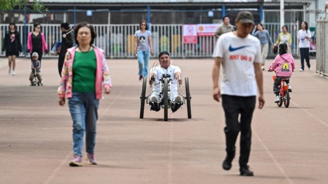 AFP__20240528__34U32W7__v2__MidRes__ChinaDisabilityOutdoorsLeisureCycling.jpg