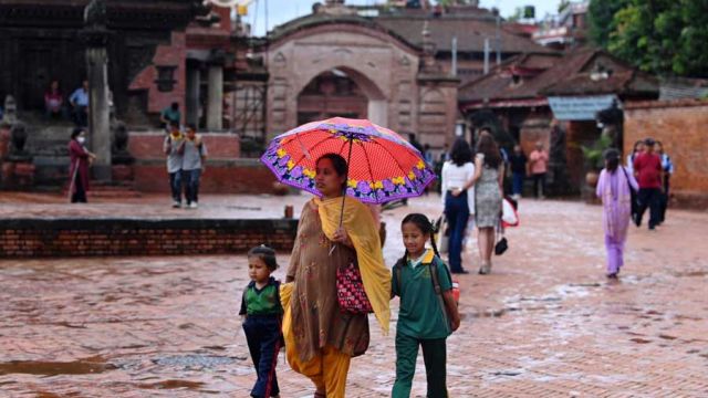 AFP__20240703__362K7P7__v1__MidRes__NepalWeatherRain.jpg