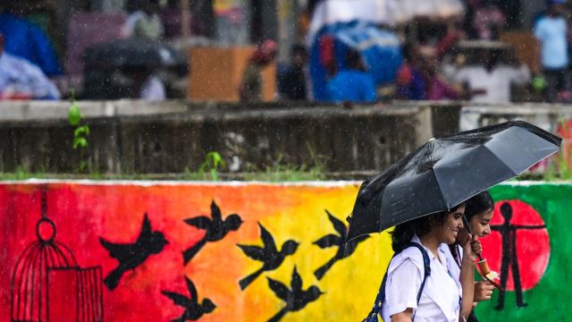 AFP__20240902__36FC9RV__v1__MidRes__BangladeshWeatherRain.jpg