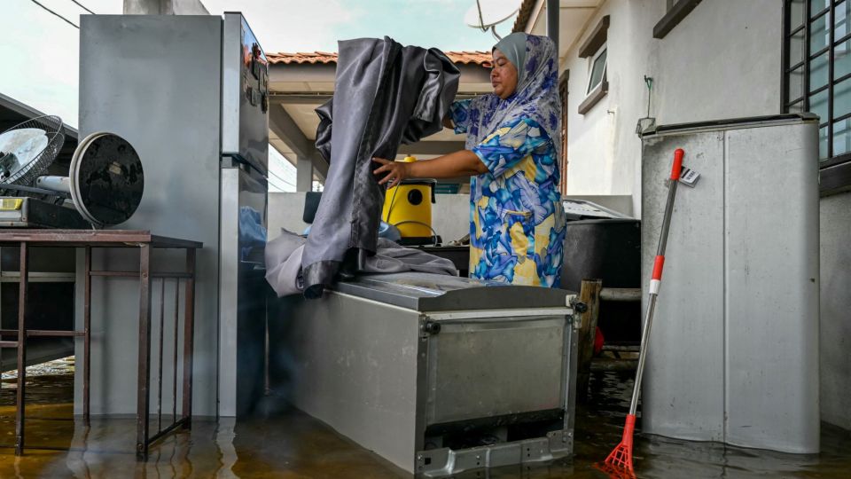 AFP__20241203__36P82AT__v1__MidRes__MalaysiaFlood.jpg