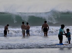 Police search for two men with Australian accents in deadly Bali shooting
