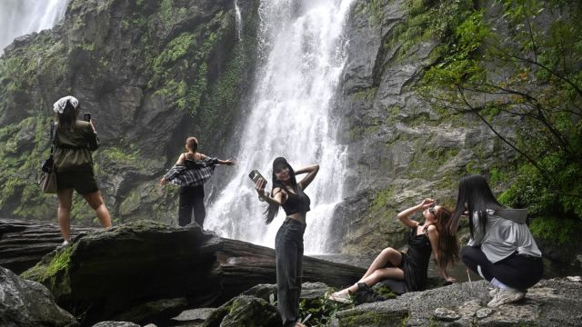 AFP__20250610__49QL38G__v2__MidRes__TopshotThailandEnvironmentTourismWaterfall.jpg