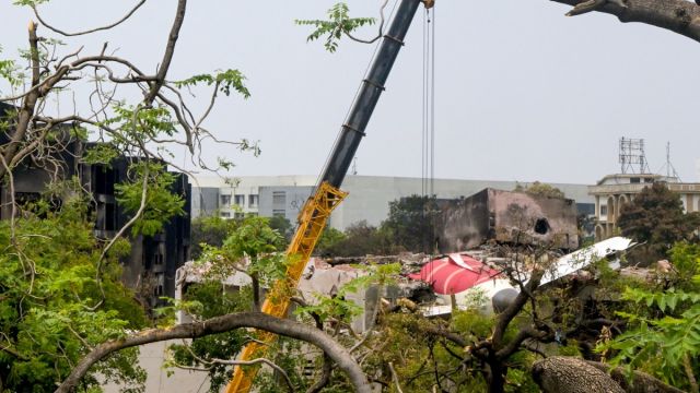 AFP__20250614__62CJ99F__v2__MidRes__IndiaAviationCrash.jpg