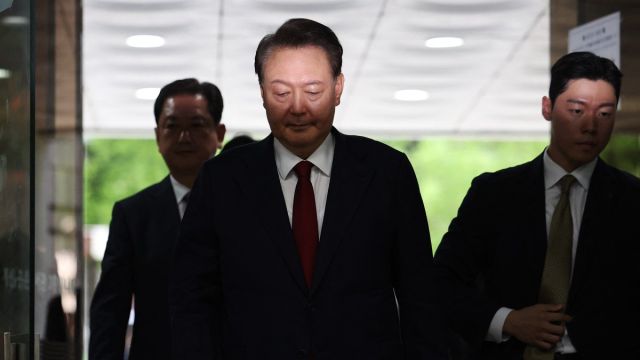 AFP__20250709__668Q49E__v2__MidRes__SkoreaPoliticsYoon.jpg