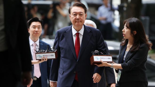 AFP__20250709__668Q4G3__v2__MidRes__SkoreaPoliticsYoon-1.jpg
