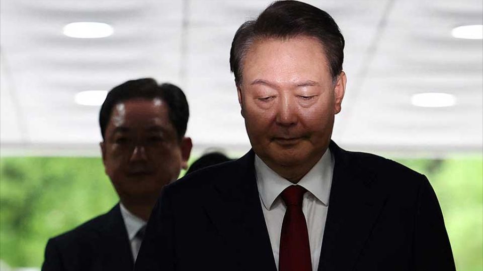 AFP__20250709__668Q79E__v1__MidRes__SkoreaPoliticsYoon.jpg