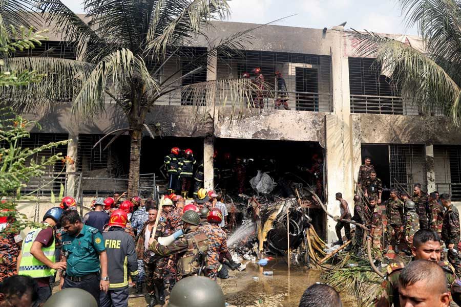 AFP__20250721__67CU994__v8__MidRes__TopshotBangladeshAviationCrash.jpg