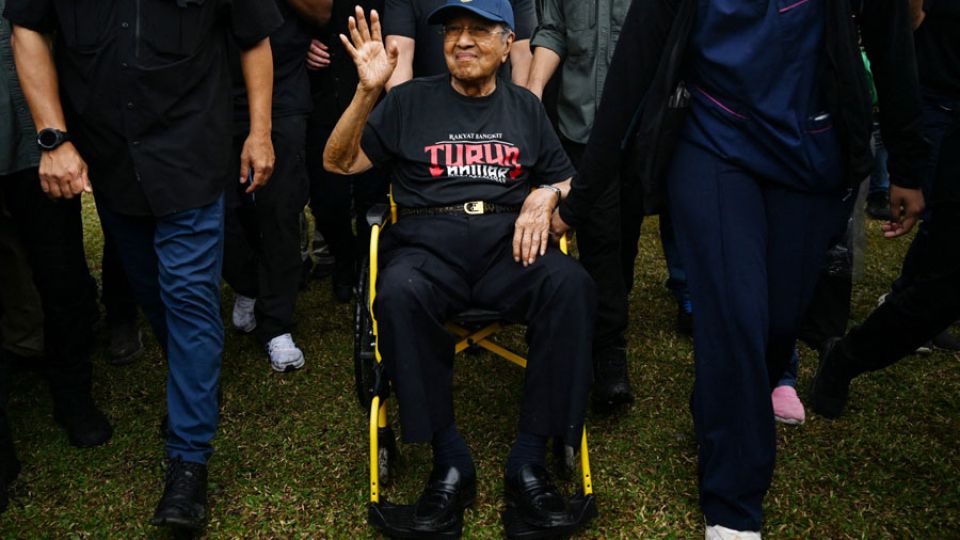 AFP__20250726__67WM69T__v2__MidRes__TopshotMalaysiaPoliticsMarch.jpg