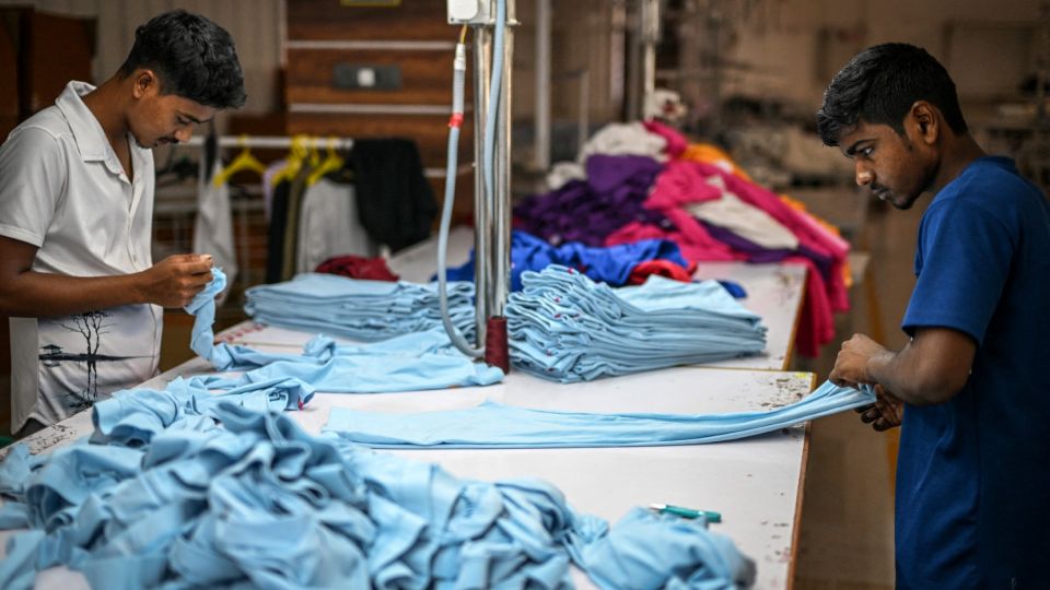 AFP__20251008__76VG73H__v1__MidRes__IndiaUsTariffTradeTextile-1.jpg