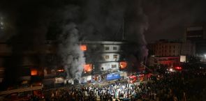 Search operation begins to locate over 50 missing people at Karachi shopping centre as fire doused after 24 hours