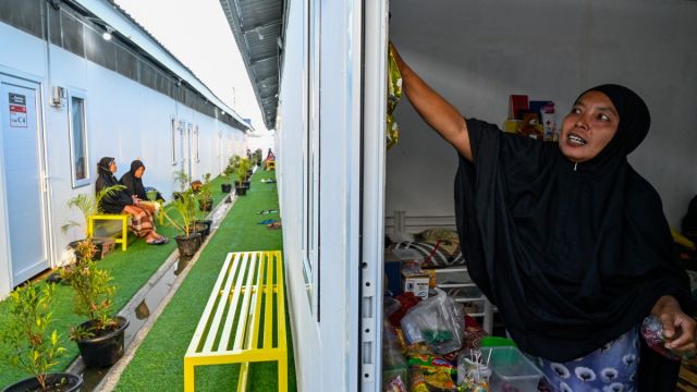 AFP__20260225__98KX43X__v1__MidRes__IndonesiaFlood.jpg